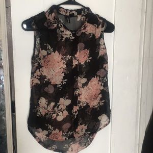 Top, very flowy, has skulls and pink roses.